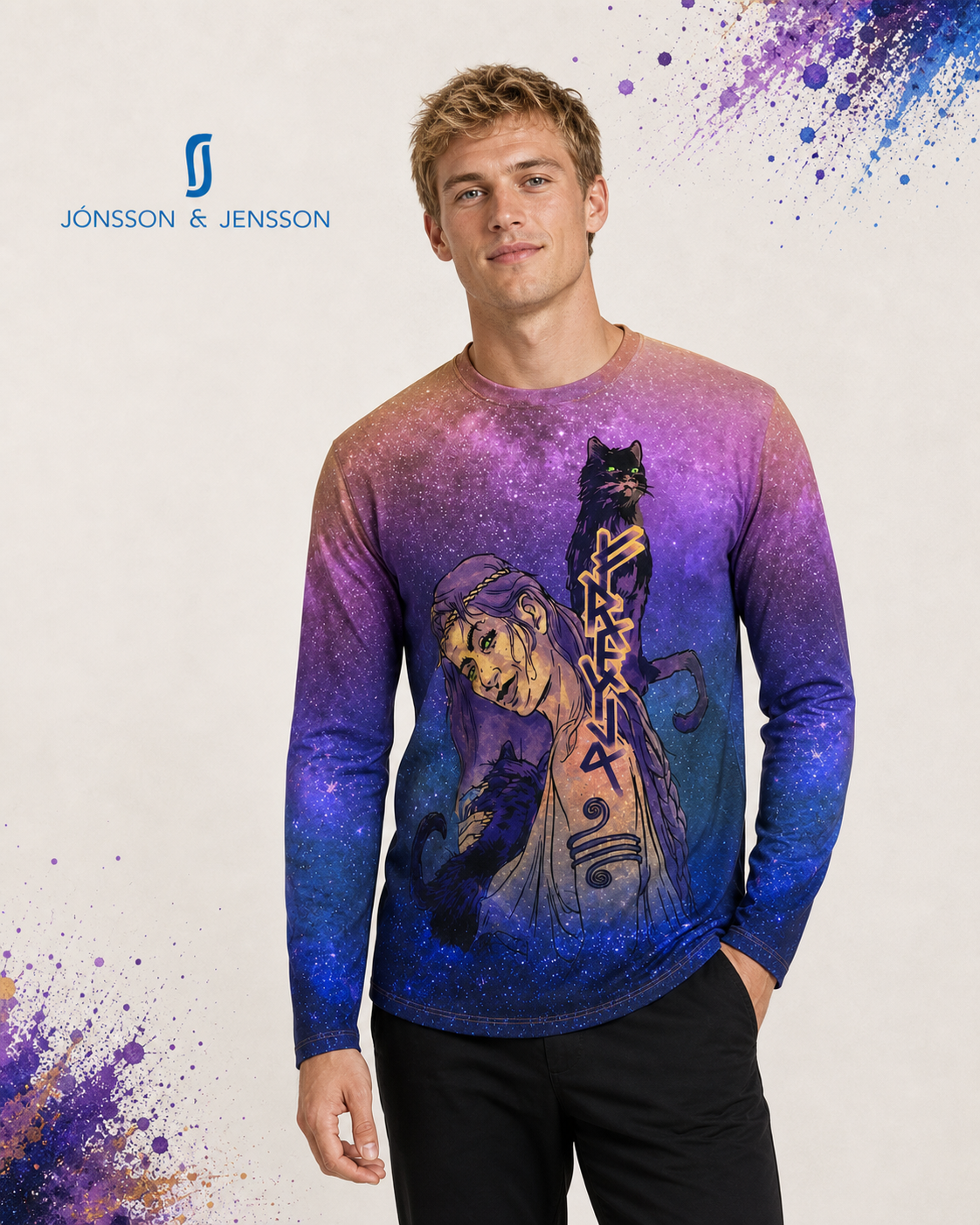 A man wearing a long-sleeve crewneck shirt with a purple and blue galaxy print and a graphic of a woman and a black cat, posed against a light background.